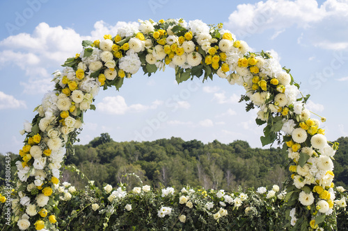 Wedding arch against the blue sky