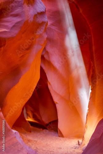 Antelope Canyon near Page, Arizona is narrow. Orange sandstone with soft, layered texture