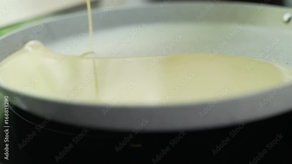 Pancake in a frying pan.