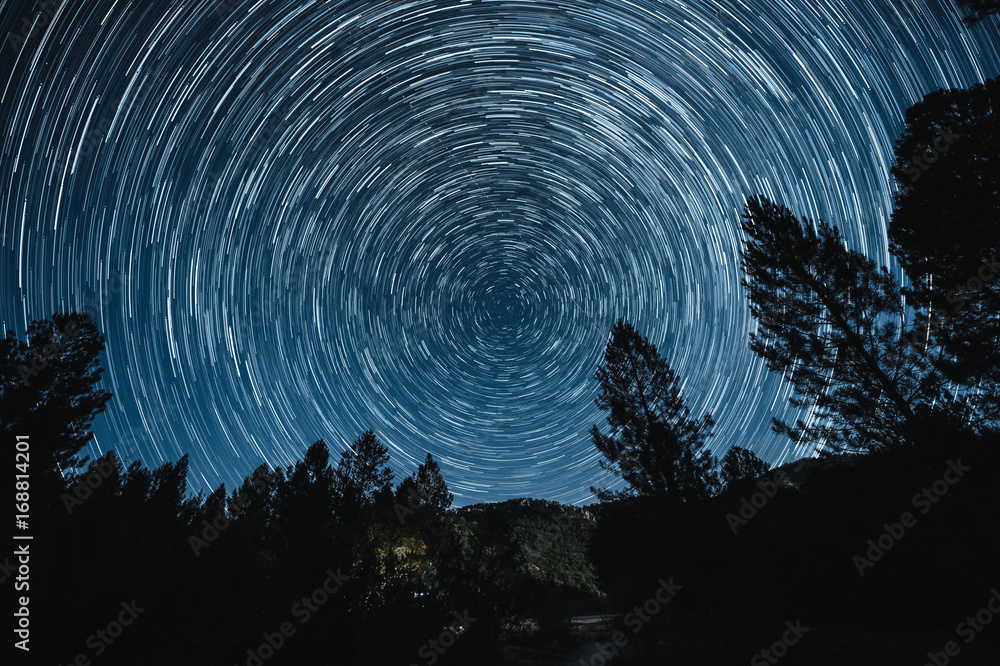 Fototapeta premium Startrails shot over night sky in Alto Tajo