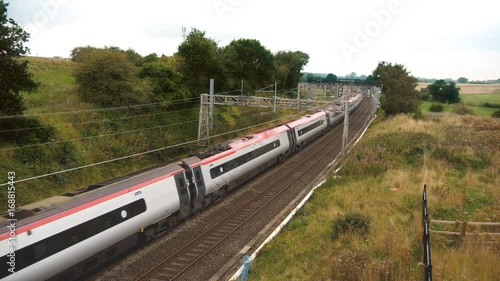 STAFFORDSHIRE, ENGLAND - 22ND AUGUST 2017: passenger train passing through countryside