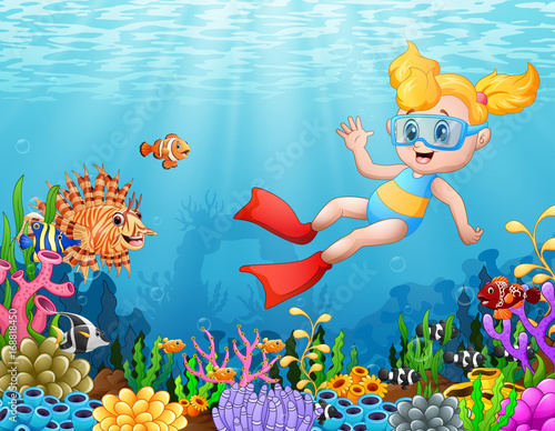 Little girl diving in the sea