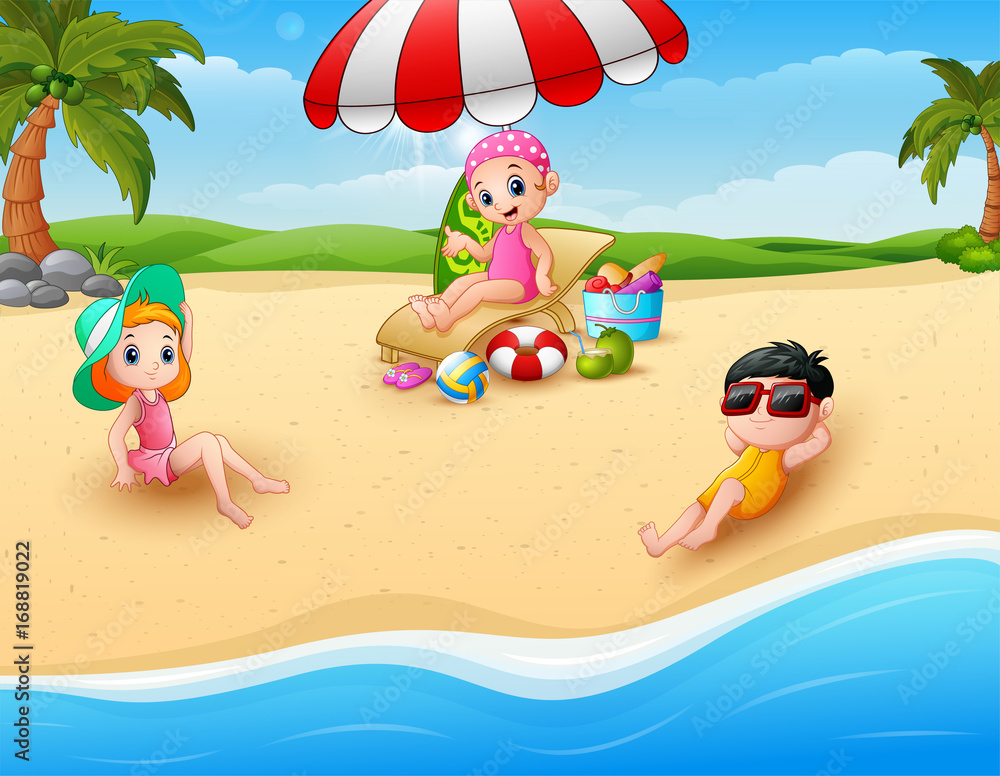 Children sunbathing on the beach 