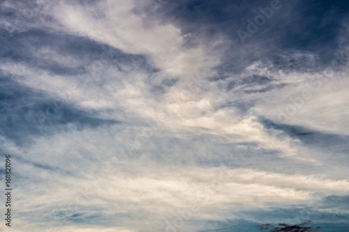 Colorful dramatic sky with cloud at sunset.Sky with sun background