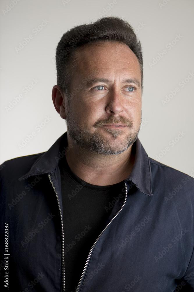 Fototapeta premium Portrait of Bearded Man in Shirt and Jacket Looking Away