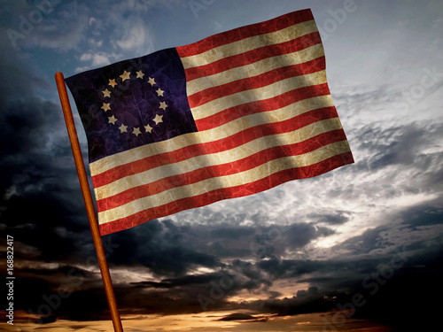 Old American Flag waving over sunset, USA flag for USA Independence Day, USA Betsy Ross flag