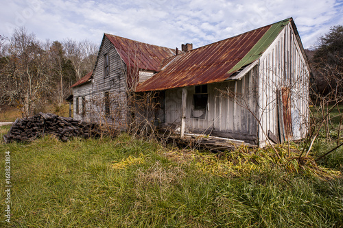 White Walls and Rusted Tin Roof - Abandoned Farm House