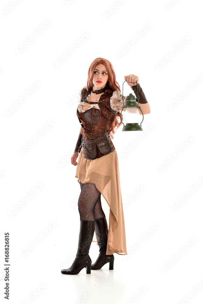 full length portrait of a pretty red haired lady wearing steampunk inspired outfit, standing pose, isolated against white background full length portrait of a pretty red haired lady wearing steampunk inspired outfit, standing pose, isolated against white background