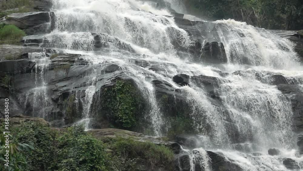 Great waterfall slow motion in Rainforest Chiang mai, Thailand. Great waterfall slow motion in Rainforest Chiang mai, Thailand.