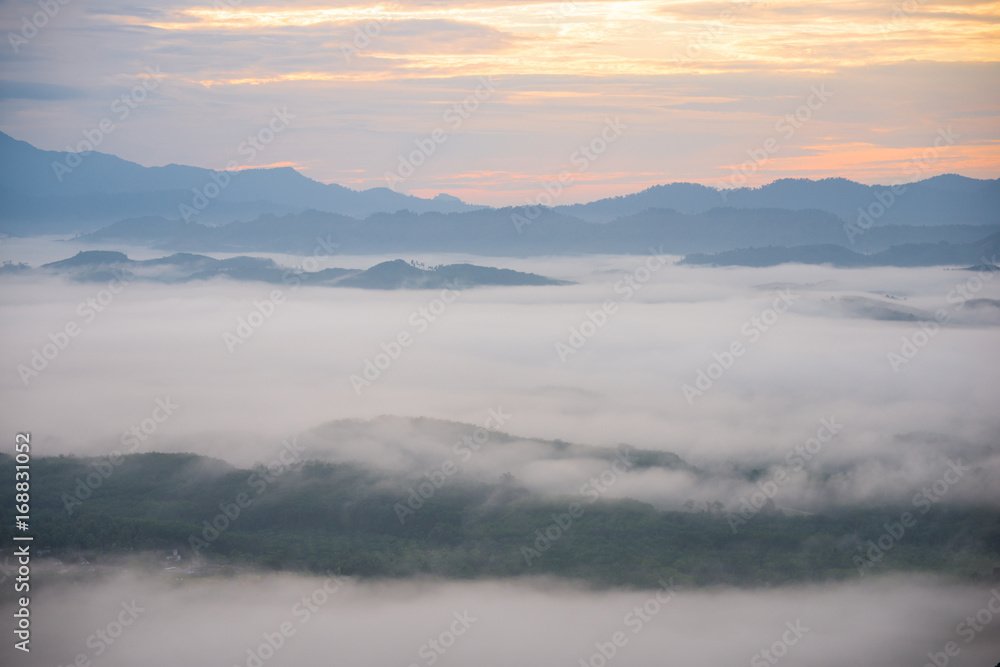 Landscape of misty mountain forest covered hills at khao khai nui
