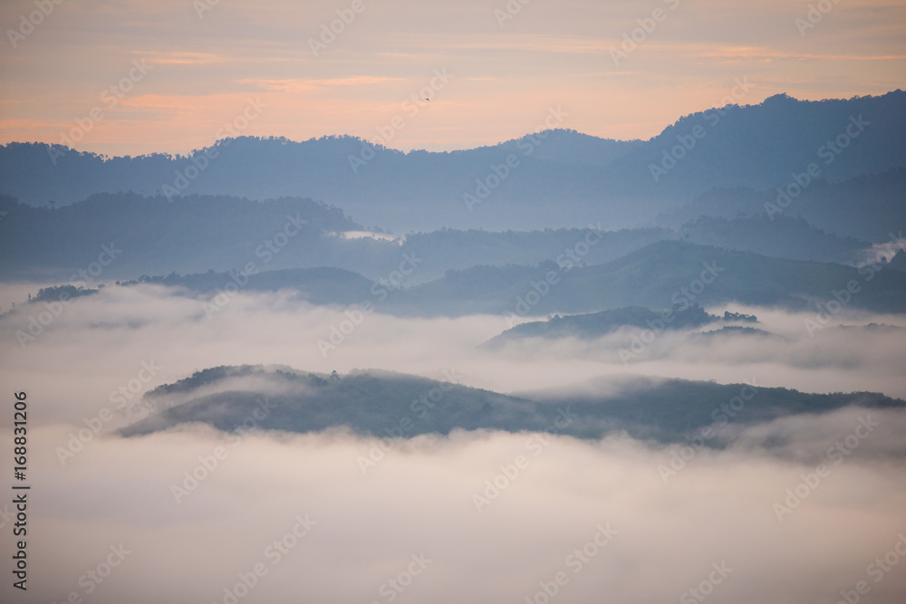 Landscape of misty mountain forest covered hills at khao khai nui