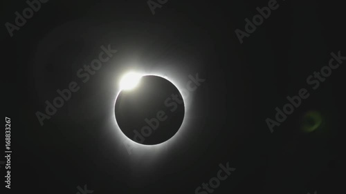 The 'Diamond Ring' effect at the end of totality during a complete solar eclipse in August 2017 as seen from the state of Oregon.  photo