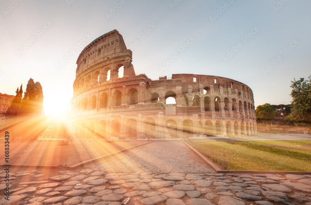 Colosseum at sunrise, Rome. Rome best known architecture and landmark