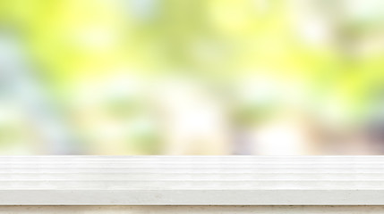 Empty white wood plank table top with green blur nature background and sun light,Mock up for display or montage of product,panoramic view,banner size for advertise on online media