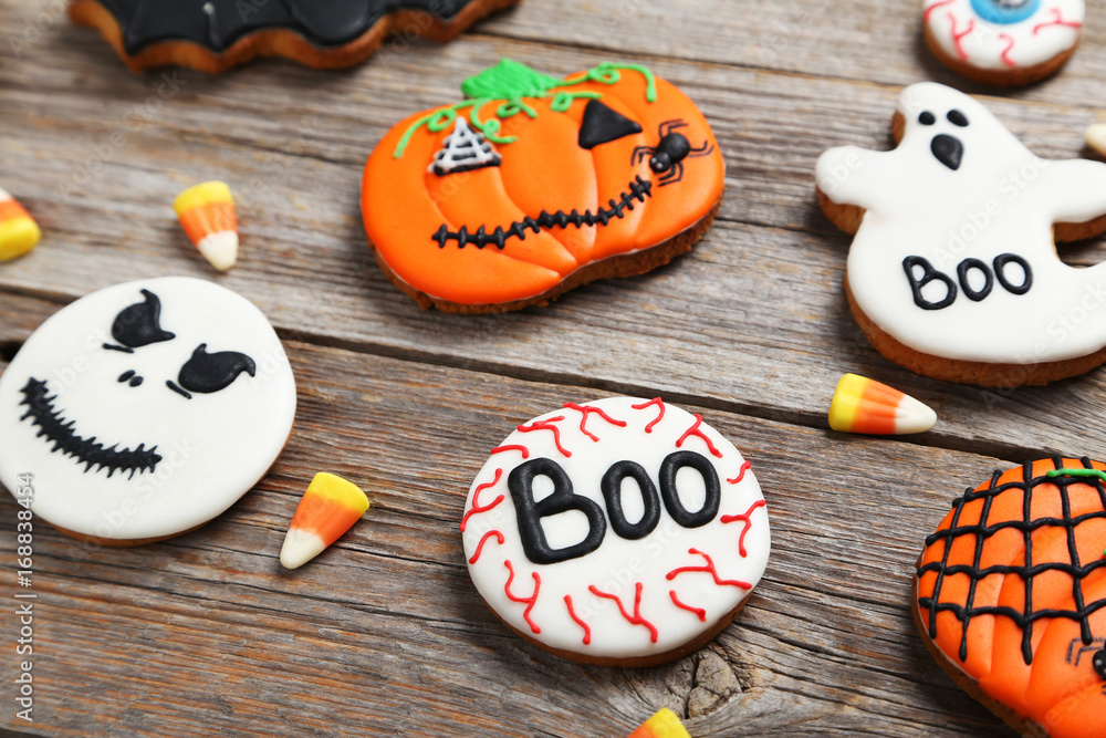 Fresh halloween gingerbread cookies on grey wooden table Fresh halloween gingerbread cookies on grey wooden table