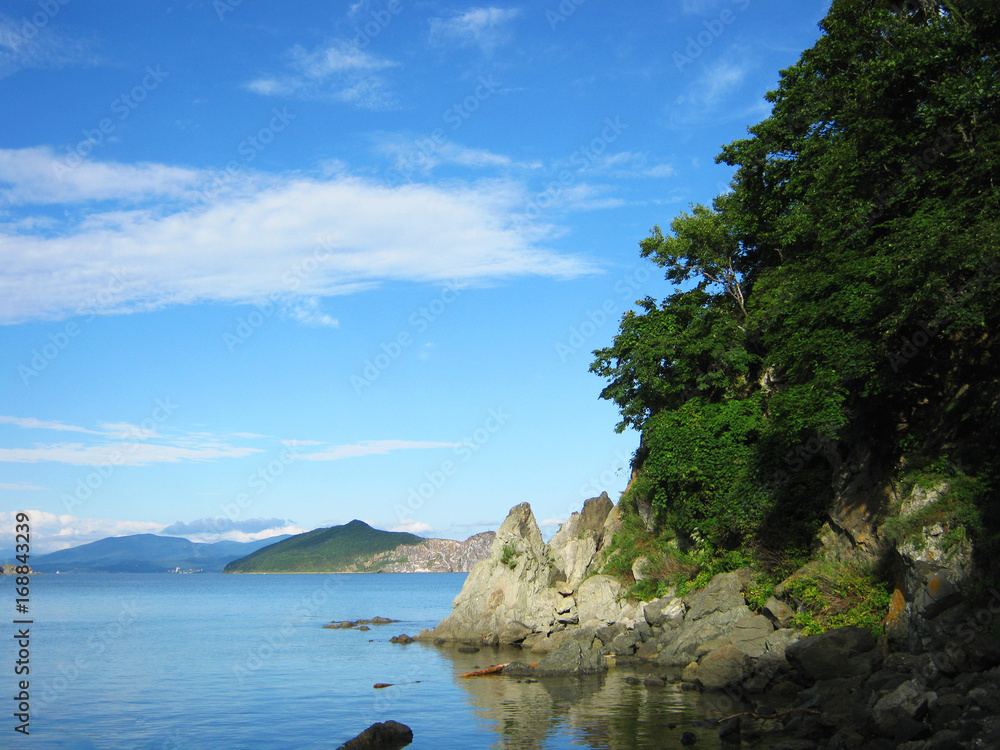 Coast rocks and island in the sea landscape