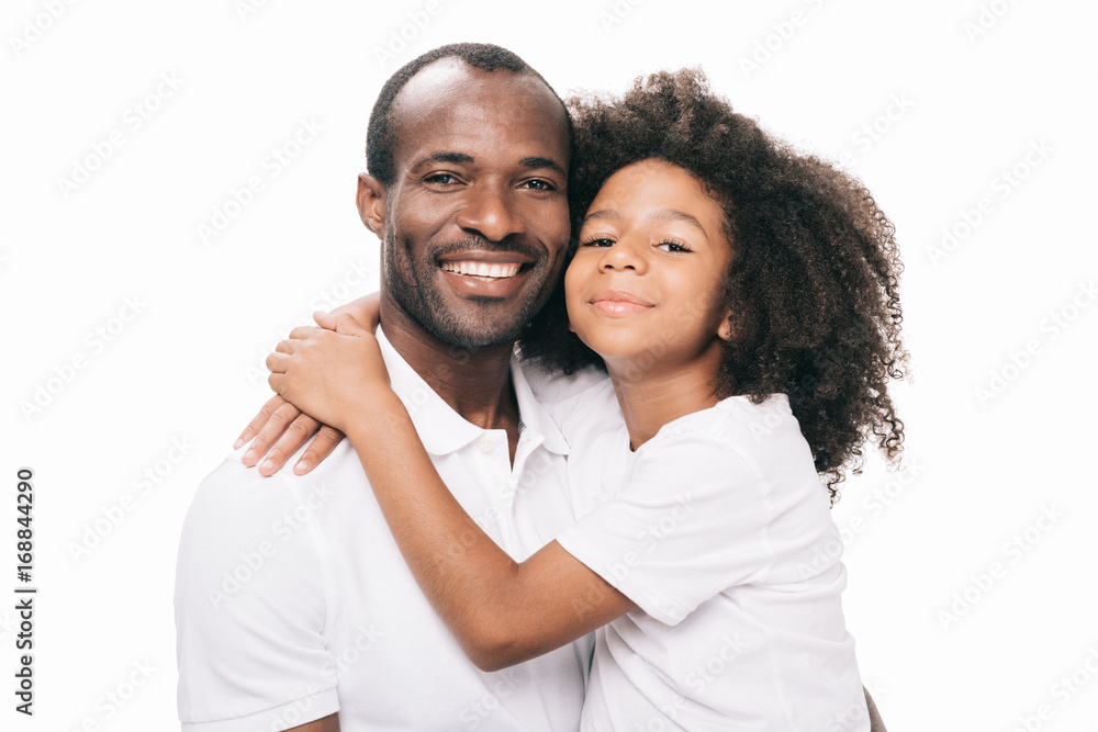 african american father and daughter hugging african american father and daughter hugging