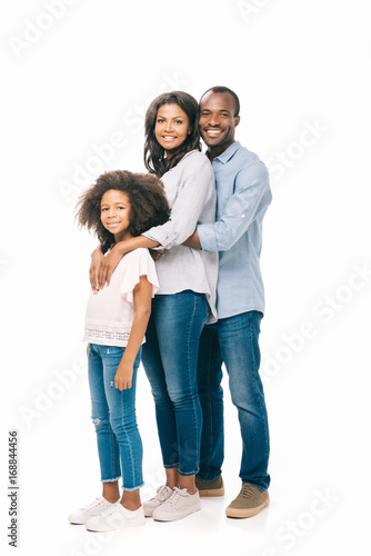 happy african american parents with daughter