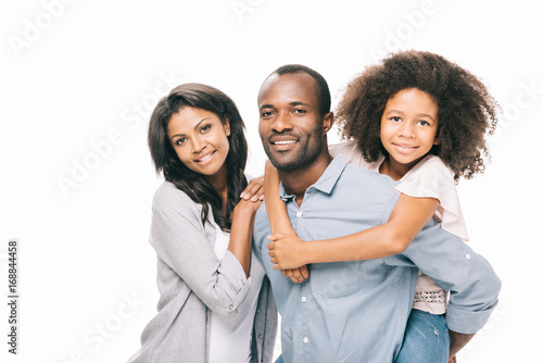 happy african american parents with daughter