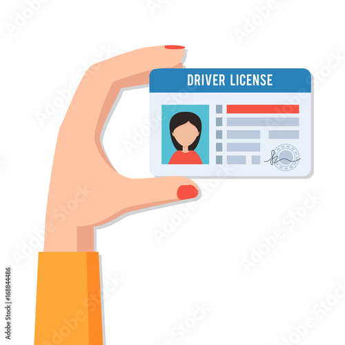 Female hand with driver license