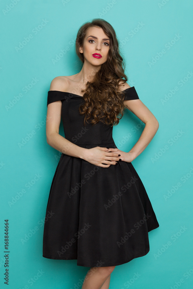 Beautiful And Fragile Young Woman In Black Cocktail Dress Beautiful And Fragile Young Woman In Black Cocktail Dress