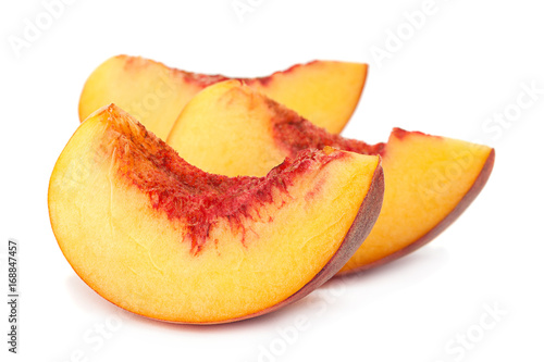 Peach fruit slice on white