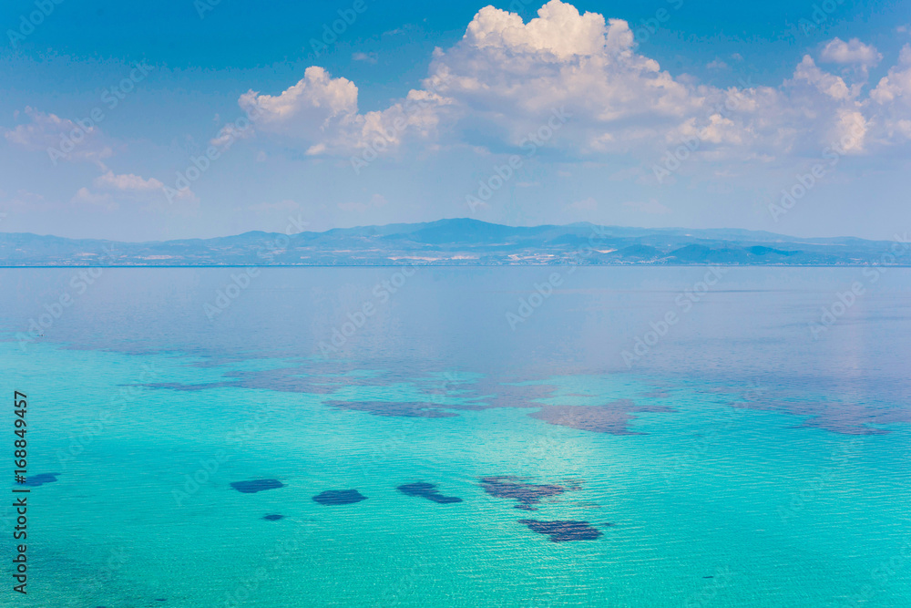 Pure blue water of the Mediterranean Sea, Greece Pure blue water of the Mediterranean Sea, Greece