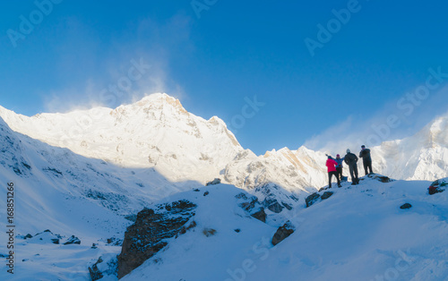 Annapurna Base Camp, Nepal AUG 23 2017 : There are many backpacker on the Annapurna Base Camp Nepal, They have trekked for several day to here and they are taking a photo with friend © tanapipat