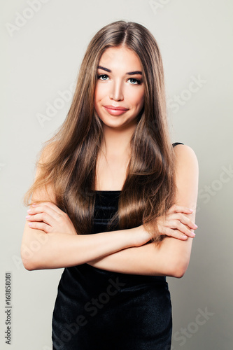 Beautiful Woman Fashion Model with Natural Brown Hairstyle and Perfect Skin. Beautiful Model with Long Healthy Hair