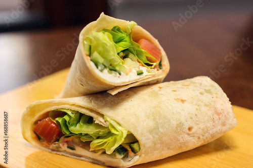Tortilla with salmon, cheese and chicken