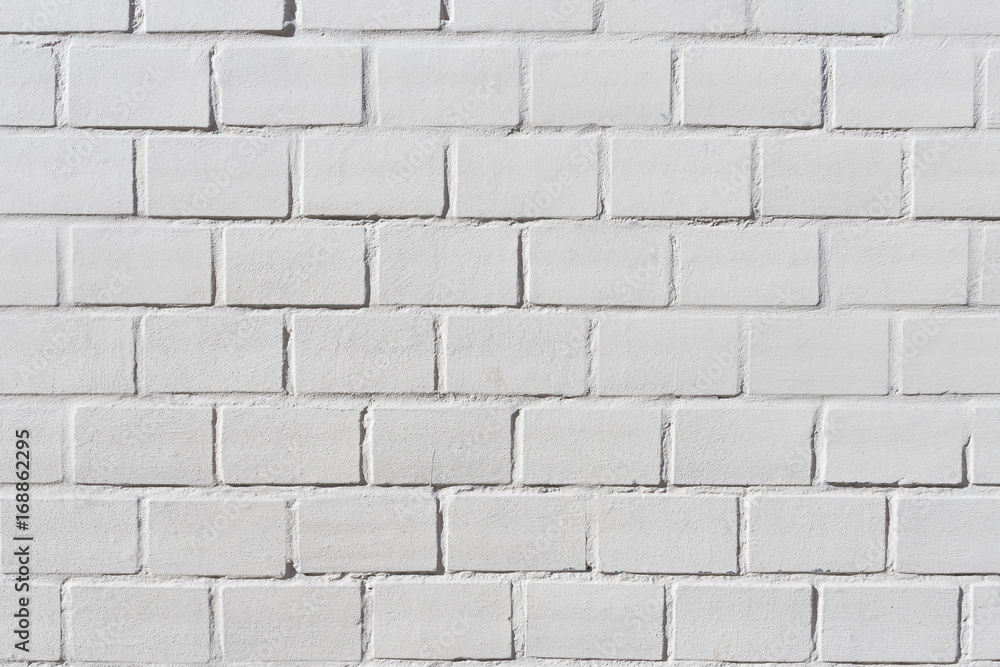 Naklejka premium Background texture of a old white brick wall