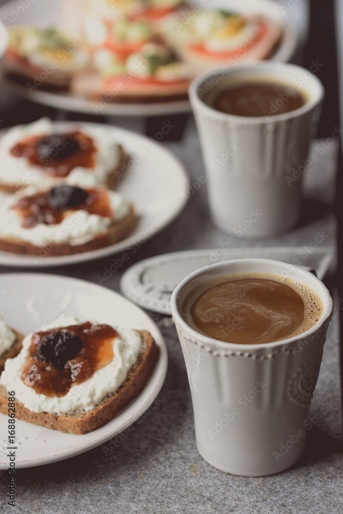 Breakfast with dark bread, white cheese , jam and coffee. Breakfast with dark bread, white cheese , jam and coffee.