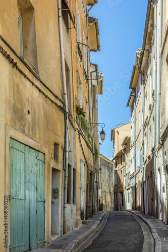 narrow street with facade of old houses in Aix en Provence © travelview