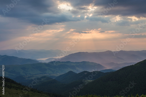 Majestic sunset in the mountains landscape. © Ryzhkov Oleksandr