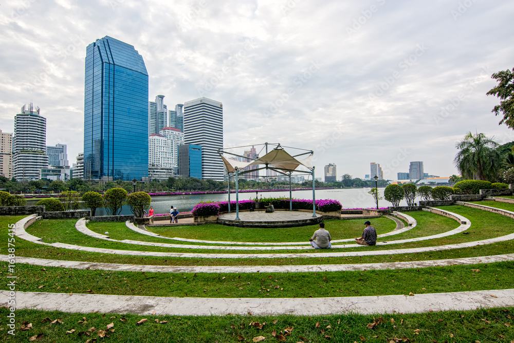 People were sitting in the park on December 31,2016 in Bangkok,Thailand.