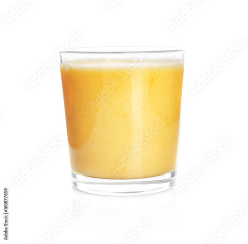 Glass of delicious orange yogurt smoothie on white background