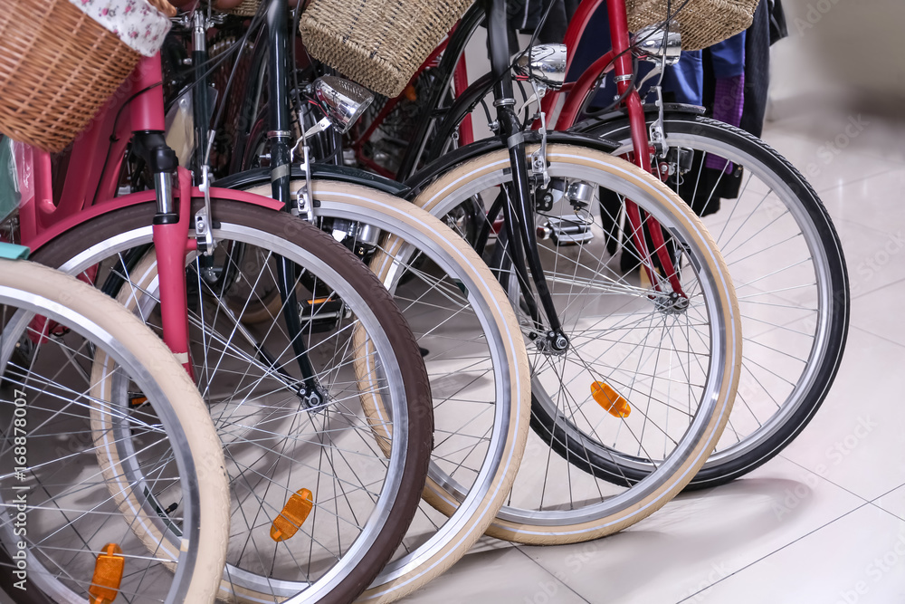 Row of new modern bicycles in shop Row of new modern bicycles in shop