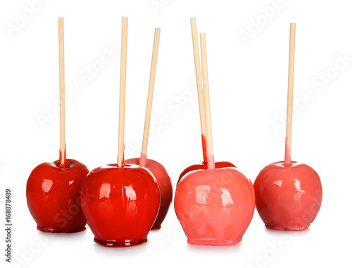 Delicious candy apples on white background