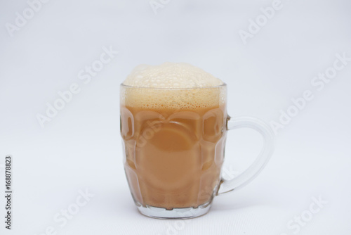 Tea With Milk Or Popularly Known As Teh Tarik Over White Background