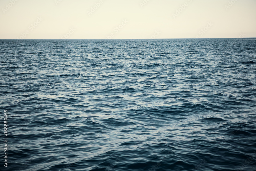 Fototapeta premium sea water smooth surface, ocean reflection