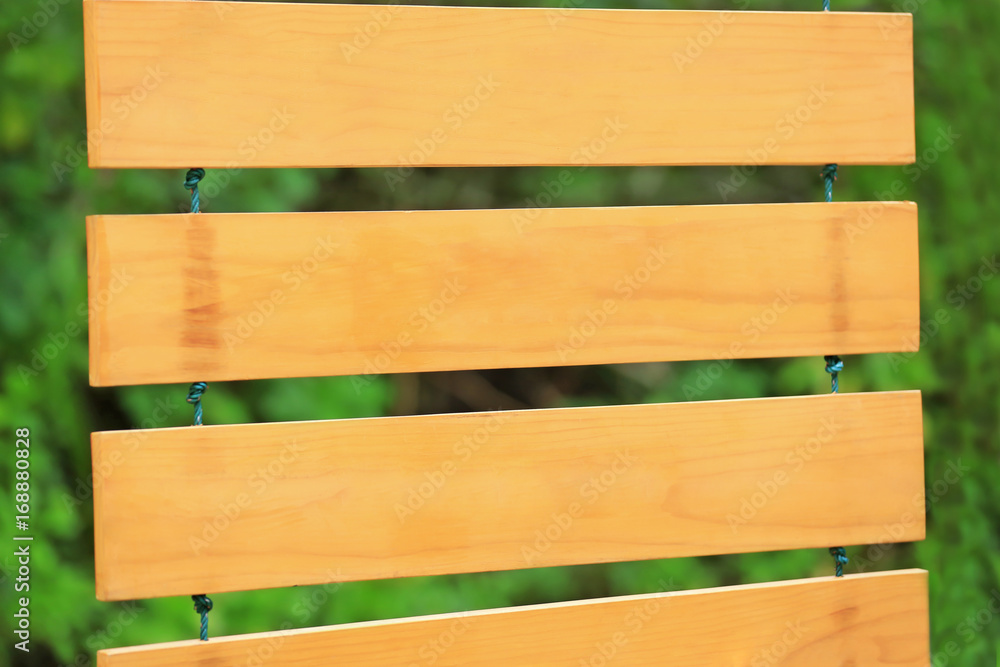 Blank wooden directional signs outdoors, closeup