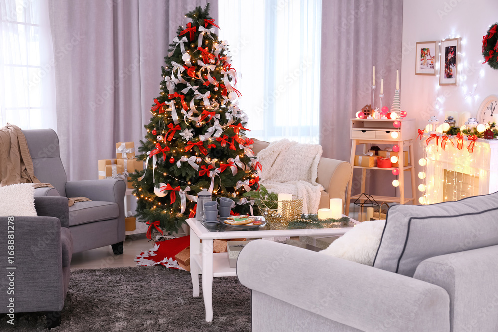 Decorated living room with beautiful Christmas tree