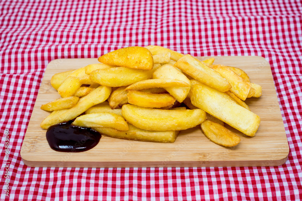 Golden French fries potatoes ready to be eaten Golden French fries potatoes ready to be eaten