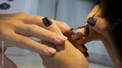 Close up with gel construction on nail procedure