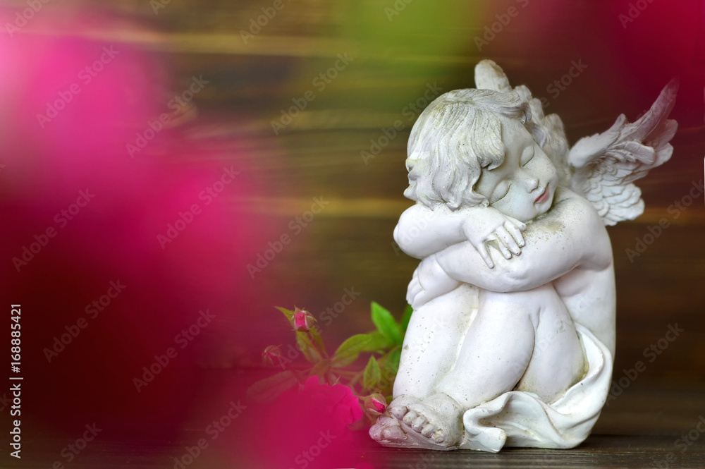 Condolence card with guardian angel and funeral flowers Condolence card with guardian angel and funeral flowers