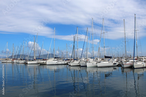 Marina view. Sailing boats in the harbour in Sardinia 
