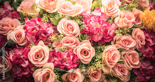 Rose bouquet close up background. © photonewman
