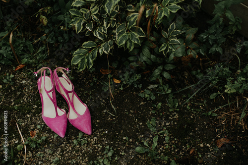 Classy fuschia pink heels in garden photo