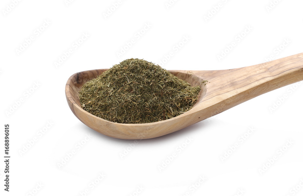 Pile of dry dill in wooden spoon isolated on white background Pile of dry dill in wooden spoon isolated on white background