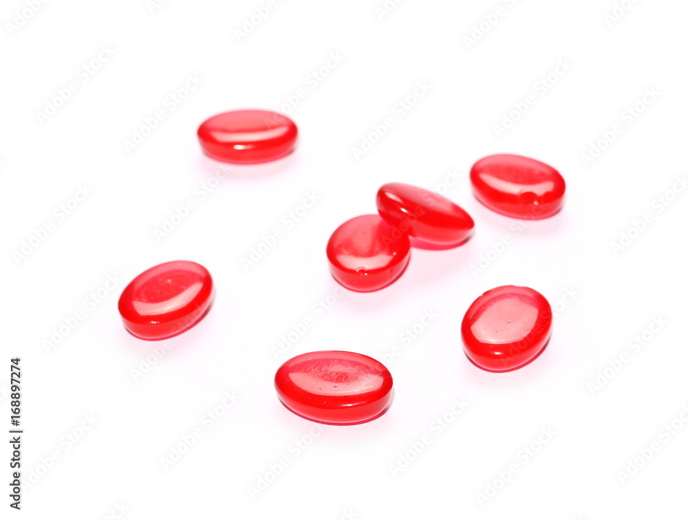 Red candies isolated on white background Red candies isolated on white background